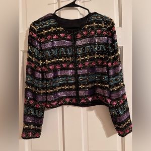 Beautiful handmade blouse, a little bit heavy.